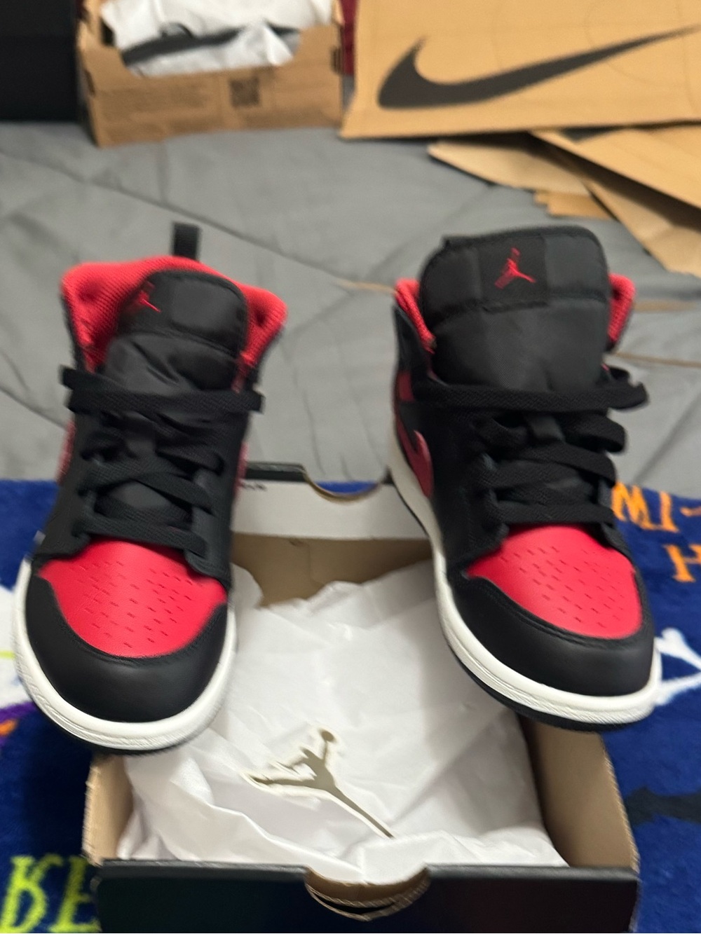 Air Jordan 1 Mid Kids Black and Red High-Top Sneakers